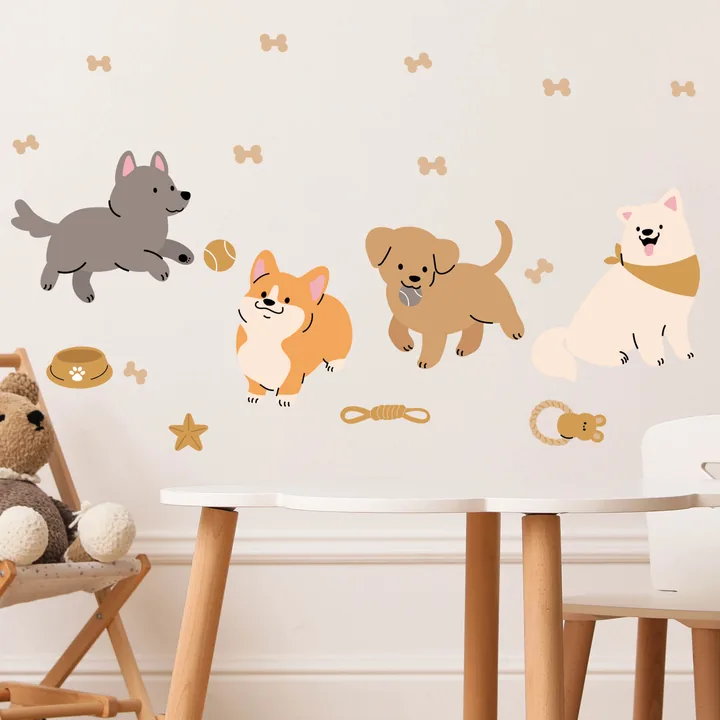 Adesivos de cachorrinhos em parede de quarto infantil